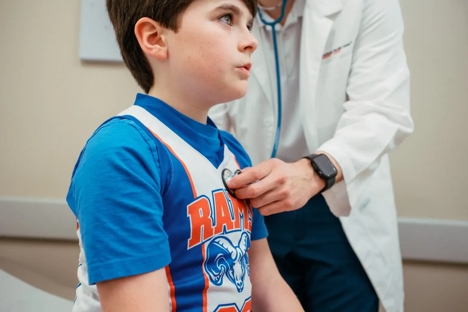 Boy getting a sports physical at AFC Urgent Care
