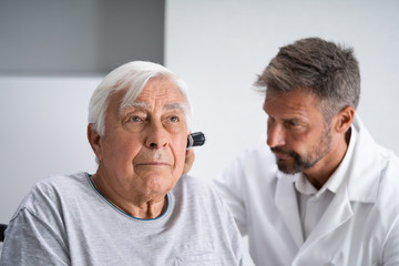 Old man coming into AFC Urgent Care Torrington for swimmer’s ear after being in a high bacteria concentrated pool