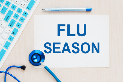 flu season calendar and stethoscope