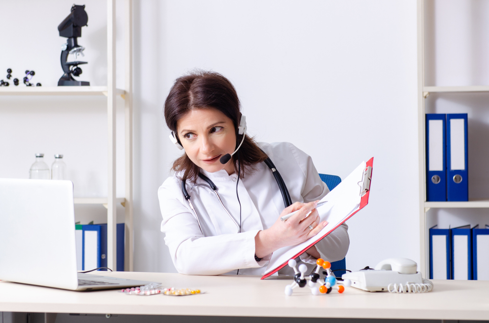 Provider consults patient via telemedicine