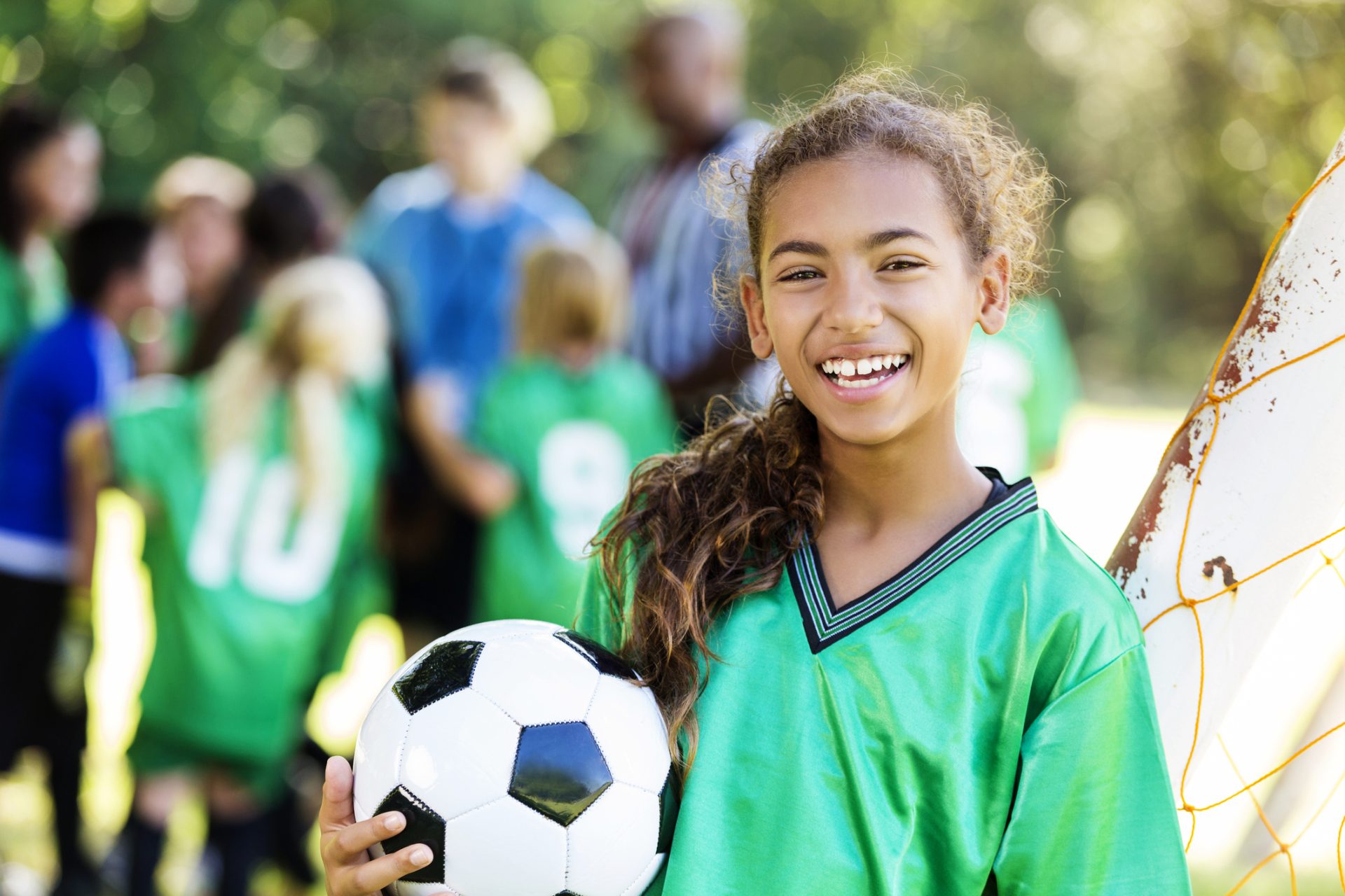 kid with soccer ball