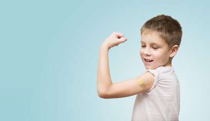 Child flexing that he got his flu shot at AFC Urgent Care Springfield