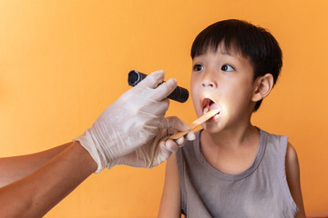 AFC Urgent Care Torrington Explains To A Little Boy The Differences Between whether he has COVID-19 or Strep Throat