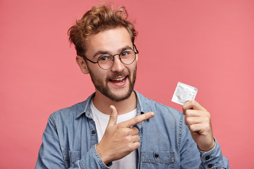 Man being prepared to avoid STDs with a condom